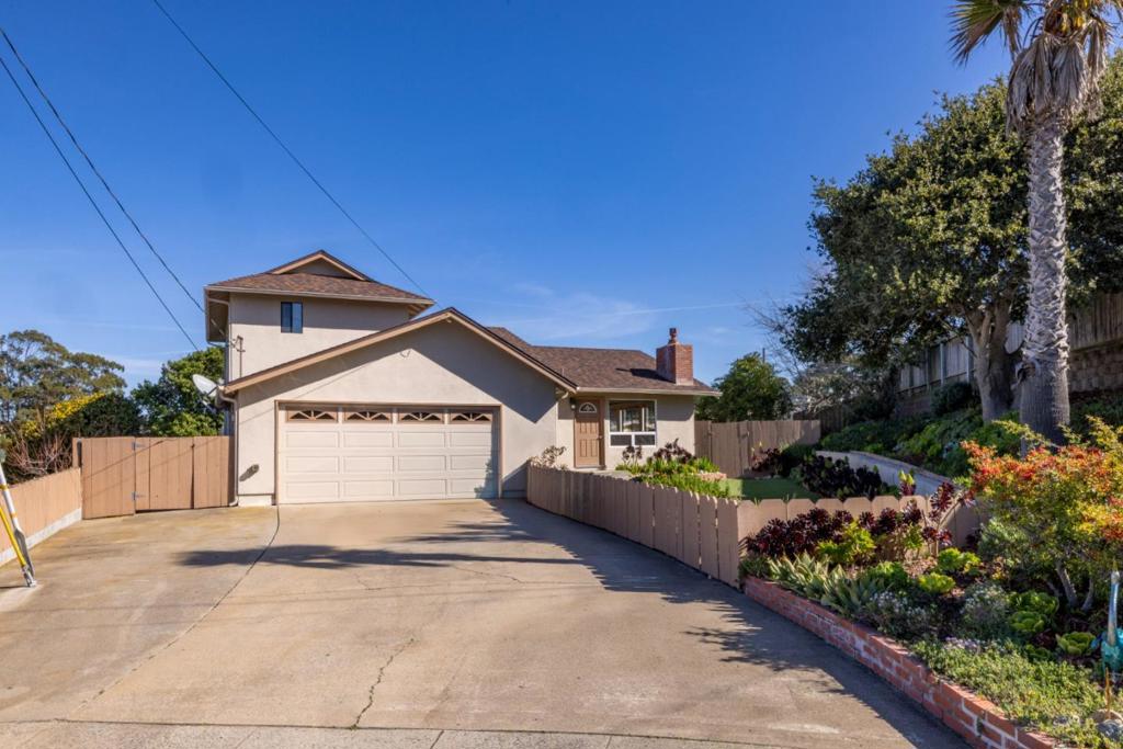 If you are looking for an investment with a bonus, come take a look at this home. You can rent the main house and keep the attached ADU with private entrance for your get away and reap the benefits of all this coast has to offer! Located in Seaside on a quiet court at the top of the hill; 2,148 sq. ft. of living space, including the ADU. The kitchen serves as a central hub, seamlessly connecting to the dining area in the family room, perfect for gatherings and meals. A separate family room provides additional space for relaxation and entertainment. The main floor consists of 3 bedrooms and 2 baths. The ADU on second floor has has a bedroom, bath and kitchen. It has a beautiful view as well! Enhancing its appeal. The exterior is low maintenance and has a huge deck for outdoor entertaining and included sheds for additional storage. The home is located within the Monterey Peninsula Unified School District. Completing this property is a two-car garage, providing ample storage and parking space.