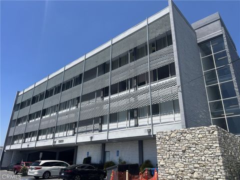 Photo of 10800 Paramount Boulevard #406, Downey, CA 90241 (MLS # HD26150954)