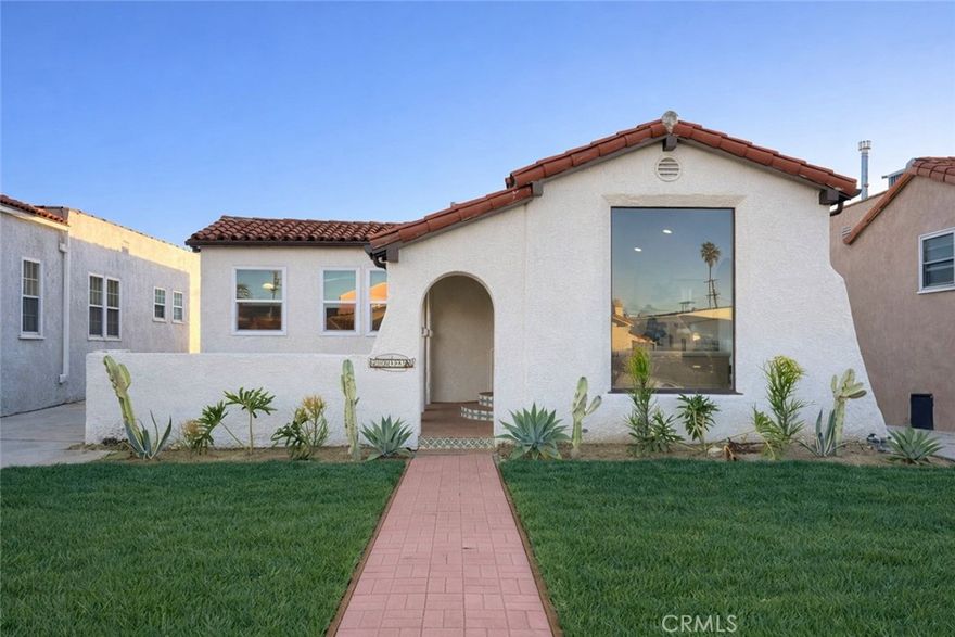 Welcome to this beautifully renovated Spanish-style home located in the highly desirable Manchester Square neighborhood of Los Angeles, just minutes from Inglewood. Situated approximately two miles from SoFi Stadium, this home offers the perfect blend of classic charm and modern living.

Thoughtfully updated throughout, the home features handcrafted custom Spanish tile imported from Mexico, paired with beautifully refinished original hardwood floors that add warmth and character. The functional layout includes 3 spacious bedrooms and 2 full bathrooms, including a private primary suite with a walk-in closet and a custom stand-up shower. The secondary bathroom showcases sleek, modern concretta finishes for a contemporary touch.

The kitchen is the true centerpiece of the home, featuring a large peninsula ideal for entertaining, custom cabinetry, and updated appliances—perfect for gatherings both big and small.

Step outside to a generous backyard complete with a wooden deck, ideal for family gatherings and outdoor entertaining. Additional highlights include an upgraded 200-amp electrical panel with EV charger, a detached 2-car garage, and a spacious lot that offers flexibility for future possibilities.

This turnkey home offers style, comfort, and location—don’t miss the opportunity to own a stunning Spanish home in one of LA’s most sought-after neighborhoods.