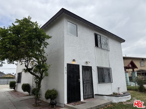 Photo of 633 W 75th Street, Los Angeles, CA 90044 (MLS # 26832661)