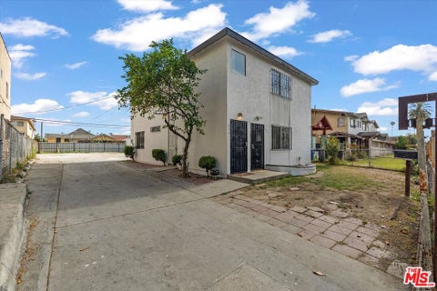 Photo of 633 W 75th Street, Los Angeles, CA 90044 (MLS # 26832661)