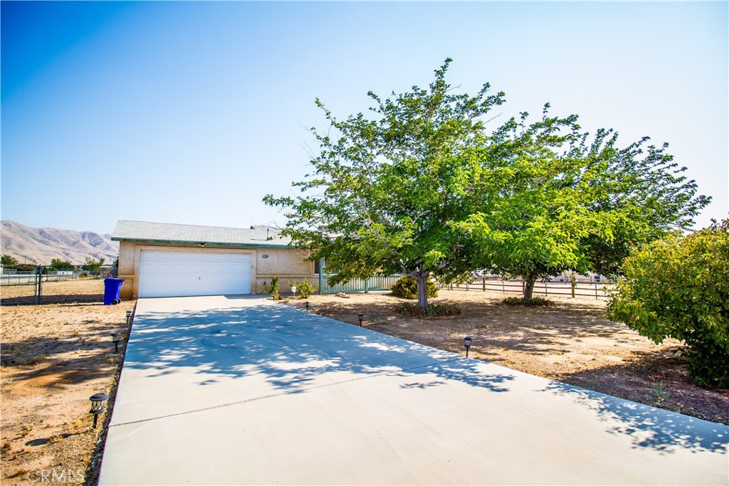Great Opportunity for Homeownership in Apple Valley! This charming 2-bedroom, 1-bath home offers 999 sq ft of functional living space, featuring a comfortable layout with separate living, dining, and kitchen areas. The spacious, fully fenced lot provides security and room to roam, while the attached two-car garage adds convenience for parking and storage. Located near shopping, schools, and restaurants in the Town of Apple Valley. This home offers both comfort and convenience! Sq. Ft. not verified. Information deemed reliable, not guaranteed.