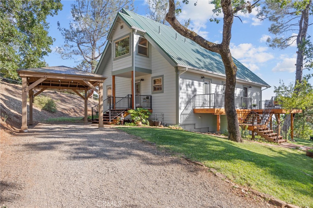 Fall in love with the breathtaking view, and experience the ultimate mountain retreat with this stunning, custom-built log home. Offering a unique blend of rustic charm and modern convenience, this fully fenced 5 acre property boasts a large shop, owned solar, three oversized horse stalls, and adjacent runs, chicken coop, dog kennel, and round pen. No expense has been spared in the renovation either, with new Decks and railings, new siding, new counter tops, new appliances, beautiful custom finish work, clean pest report, and much much more! Theres no question, whether you're an equestrian enthusiast, nature lover, or simply seeking a serene escape, this log home has it all.