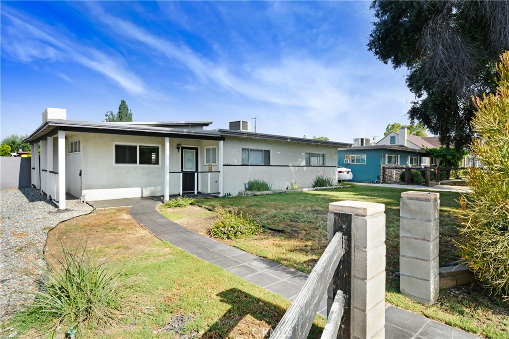 The main residence is a spacious 3-bedroom, 2-bathroom home that blends timeless character with thoughtful updates. Step inside to find a light-filled open floor plan, featuring new flooring, fresh interior paint, and recessed lighting throughout. The upgraded kitchen boasts quartz countertops, sleek cabinetry, and stainless steel appliances, perfect for both daily living and entertaining.
The generously sized primary suite offers a peaceful retreat with an en suite bathroom and ample closet space. Two additional bedrooms share a beautifully remodeled second bathroom with contemporary finishes.
Additional highlights include central HVAC, and direct access to a private yard — ideal for outdoor dining, pets, or gardening. With its own driveway and gated parking, the main house feels like a standalone home, perfect for an owner-user or premium tenant.