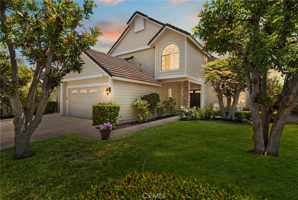 Tucked away on a peaceful cul-de-sac in the desirable Stonehedge tract of Coto de Caza, this 4-bedroom plus, 2.5-bath home offers comfort, flexibility, and endless potential. With classic curb appeal, a spacious grassy yard, and a location just a short stroll from the neighborhood park, this home is perfect for those seeking space and serenity in one of Orange County’s premier gated communities. Inside, you’ll find a bright, inviting layout with a formal living and dining area, a cozy family room with fireplace, and a bonus/flex room on the main floor—ideal for a home office, guest room, playroom, or workout space. The light-filled kitchen opens to the backyard and is ready for your personal updates and design touches. Upstairs, all four bedrooms offer comfort and functionality, including a spacious primary suite with walk-in closet and en-suite bath. Enjoy Southern California living in the private backyard, perfect for entertaining, play, or peaceful mornings under the sun. Residents of Coto enjoy access to scenic hiking trails, award-winning schools, and the exclusive Coto de Caza Golf & Racquet Club, which offers a variety of membership programs including golf, tennis, fitness, social events, and more. 10 Cambridge Ct is the perfect opportunity to step into the Coto lifestyle.