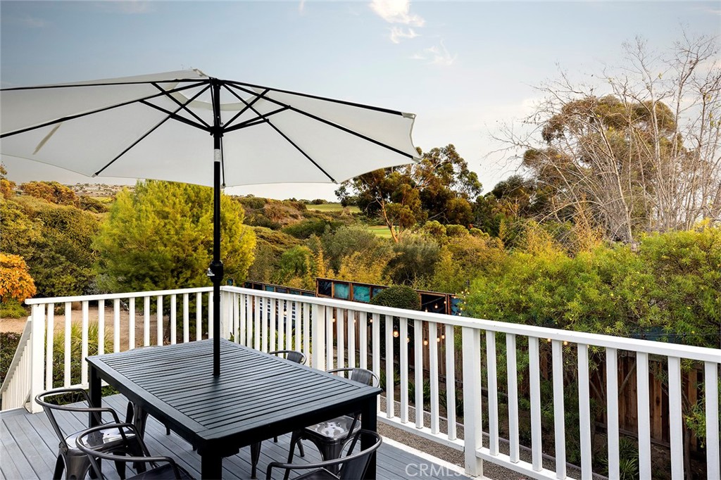 In a tranquil setting overlooking Pelican Hill Golf Course’s 9th hole with peek-a-boo ocean views, this charming single-level residence is stylishly furnished and move-in ready. The 3bd/2.5ba home boasts an ideal open floor plan, including a white-and-bright kitchen with informal den and dining area and a large great room with wood burning fireplace and plantation shutters. Three bedrooms line the home’s hallway: the secondary bedrooms have queen beds and share a Jack-and-Jill bath with shower-tub combo; the large en suite primary bedroom features a Cal king bed and walk-in closet. Perhaps most notably, however, is the property’s expansive lot – nestled amongst the trees and one of only a handful that backs to a path along the golf course. The result is the rare combination of scenic privacy and close proximity to Corona del Mar Village and its beaches. Additional home features include interior laundry, wet bar, large entertaining patio and two-car garage.
Corona Highlands residents enjoy access to the community’s private beach and lookout point shared with Shore Cliffs, in addition to a private walkway to Little Corona State Beach. The community is located within short distance to the shops and restaurants of Corona del Mar Village, Crystal Cove, Pelican Hill Resort, and Fashion Island. *Landlord willing to consider tenant concessions if requested in offer*