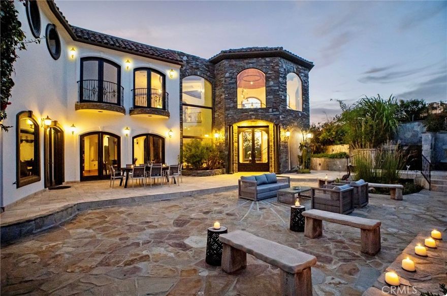 Location , Location, Location… This extraordinary Ocean View estate is going through a complete facelift! Over $200K in upgrades were made.New paint inside and out with new carpet and furnishings. Located in the high security 24-hour guard gated Luxury community of “The Country". One of LA’s Best kept secrets. With Newport Beach Ocean views, Catalina Island views and amazing Ocean breezes all summer long, this makes Shady Ridge one of the most sought-after estates in all of “The Country”. Motivated Sellers!! The sellers have purchased their new home! Along with a 6-car garage, incredible gourmet kitchen with amazing ocean views from your kitchen sink, elevator, wine cellar, endless swim pool with waterfall and home theater an easy choice. Ocean views from bedrooms, living room, breakfast nook, and all rooms and patios on back of this beautiful estate. Solar panels on roof are owned by owners and have cut total electric bills to $50 to $ 75 a month. Large courtyard with waterfalls, fireplace, sitting areas makes this the perfect private area for big family gatherings. Each bathroom has its own custom design and stonework with custom sink. The Gourmet Kitchen has warmer drawers, a blending mixing station, coffee station with bun warmer, vegetable steamer built in, custom vegetable cleaning station, griddle, gas cook top and an incandescent cooktop. This kitchen is a chef’s Dream kitchen. There are too many custom upgrades to mention... you have got to come see them all. There are even warmers built into the formal dining buffet. There are also maids' quarters with a full bathroom and fireplaces. This is a one owner one-of-a-kind luxury estate, designed and built by the current owners as their “Dream Come True’ estate and now it can be your “Dream Come True” estate. Welcome home!  (The 1.3 acre lot next door is for sale if you want more privacy. I am working with the agent to help get it sold). Agents or agents office does not certify square footage, sizes, or any information posted in mls. Agents and company recommends that any and all buyers and buyers agents do their own research and due diligence..