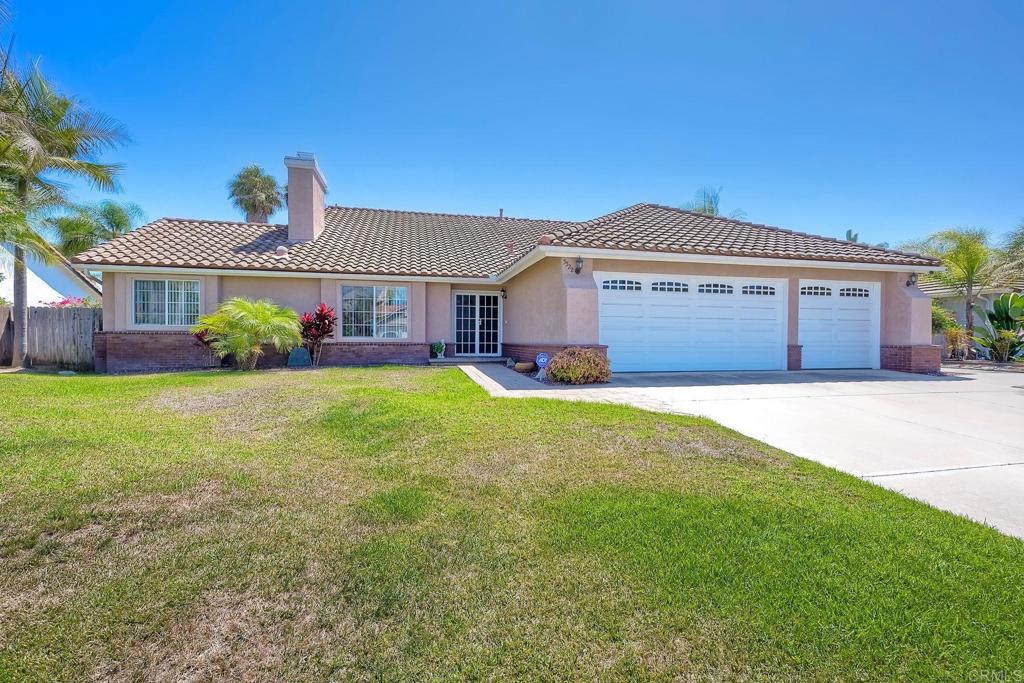 Welcome to this beautifully maintained single-story home in the highly sought-after Guajome Meadows community. This spacious residence features 4 bedrooms and 3 baths, including a permitted bedroom and bath addition that enhances the versatile floor plan. The private fourth bedroom and ensuite bath is located on the east side of the home, featuring its own entrance-perfect as a guest suite, home office, or multigenerational living. The open layout offers an inviting flow, perfect for everyday living and entertaining. Pride of ownership shines throughout, with meticulous care evident inside and out. The home sits on a large, flat lot with a low-maintenance, hardscaped backyard ideal for relaxing or gatherings. A separate oversized laundry room adds convenience and functionality. Guajome Meadows is a desirable neighborhood nestled between major freeways, offering easy access to both downtown Oceanside and historic downtown Vista. Just 8 miles from the ocean, you'll also enjoy proximity to golf courses, shopping, the bike path leading directly to the ocean, and Guajome Park, featuring trails, a lake, and campgrounds right across the street. This is a rare opportunity to own a move-in-ready home in a prime location!