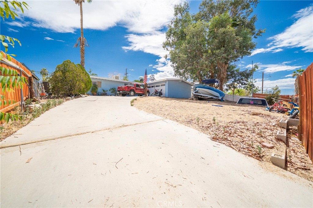 Welcome to Valley View Dr! Desert living meets thoughtful updates in this charming single-story 3-bedroom, 1.5-bath home on an expansive 8,400 sq ft lot. Offering 1,280 sq ft of living space plus an additional 450 sq ft sunroom, nearly 1800 sqft of living space, this home blends classic character with modern comfort.
Step into a warm living space featuring a cozy brick fireplace and a powerful 24,000 BTU mini split A/C & heat pump, ideal for year-round climate control. Nearly the entire home has been upgraded with new floor tile (excluding the sunroom), remodeled bathrooms with new vanities, toilets, and a Jacuzzi tub, and a re-tiled master shower.
The kitchen features updated appliances including a newer dishwasher, newer stove, and newer over-range microwave, complemented by flat-panel LED lights for a clean, modern touch. Enjoy the ease of a direct-access 2-car garage, which also includes a utility wash basin conveniently installed next to the laundry area. Here are SOME MAJOR UPDATES Roof and septic system IN 2015, Newer water heater, Newer evaporative swamp cooler, Exterior & interior paint. New LED porch lights, ceiling fans, switches/outlets, and garage door
The block wall fenced backyard offers privacy and space to entertain, garden, or relax under the stars. This home is a true blend of function and comfort, ready for its next chapter in the peaceful desert landscape. Come and see this home in person to appreciate all it has to offer.