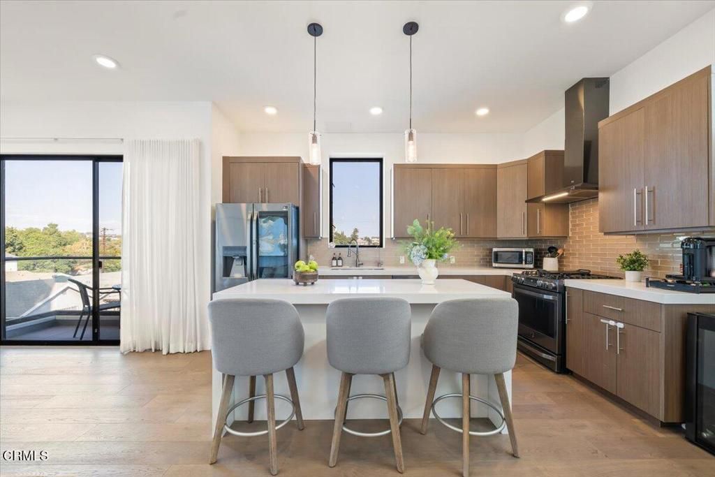 Photo of 3221 Robinson Lane, Los Angeles, CA 90026 (MLS # P1-23968)