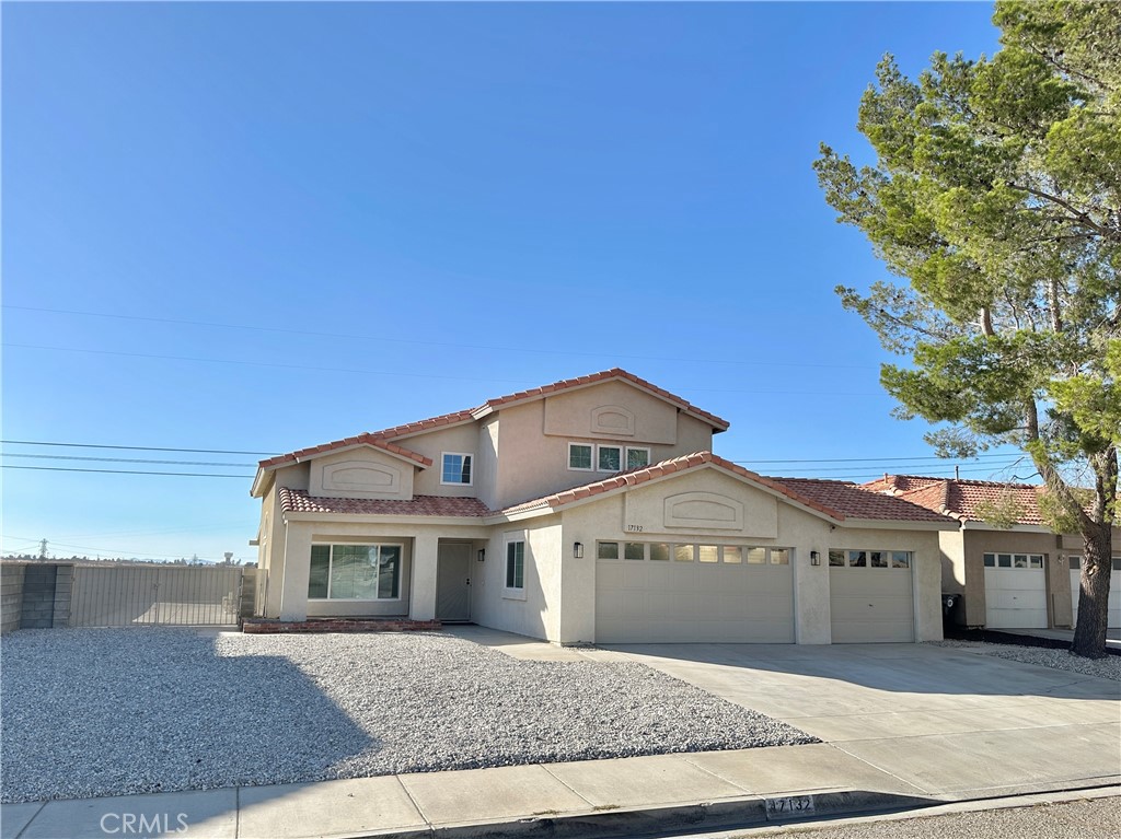 Don't wait on this 4 bedroom, 3 full bathroom POOL home in the quiet outskirts of Victorville! This home has been lovingly retouched with NEW WINDOWS w/ BLINDS, NEW FLOORS, NEW PAINT, and NEW COUNTERS throughout. The master suite features dual closets and one of the bedrooms also has a small walk-in closet. 1 bedroom/bath is located downstairs with the open kitchen, formal dining area, and living/family rooms. Complete with a large 3 car garage, indoor laundry, LARGE covered patio, and iron gates on both sides of home - there is even room for RV/Trailer access on the South side.