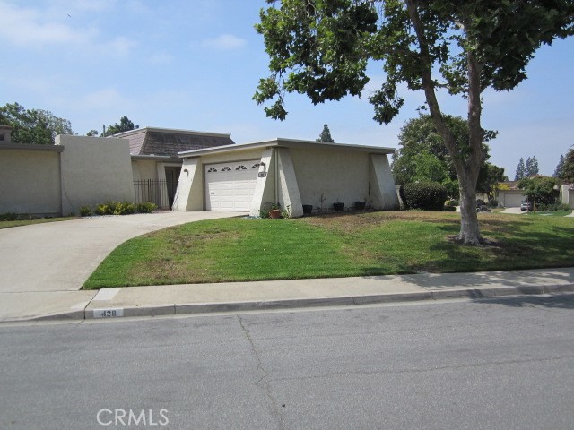 Welcome to North Claremont. Single family residence/PUD in North Claremont. 2 bedroom, 2 bath in 1832 square feet. Property is attached to neighbor with a common wall. Neighborhood has a private pool and park for residents only. A 3rd bedroom can be added simply by the addition of two interior walls. 2 car attached garage with laundry in garage. Storage galore in garage and throughout the home, there is even an attic for storage. Fireplace in living room. Brick patio that has access to the community park. Community pool is across the street. First time on the market since 2003. Property is in need of some updating but is priced accordingly. Home was re-roofed in 2022 and comes with a guarantee. Fantastic school district with Claremont High just down the street. 210 Freeway conveniently close. HOA provides common area maintenance and exterior painting. Bring your buyers as this property is priced to sell. Thanks for showing.