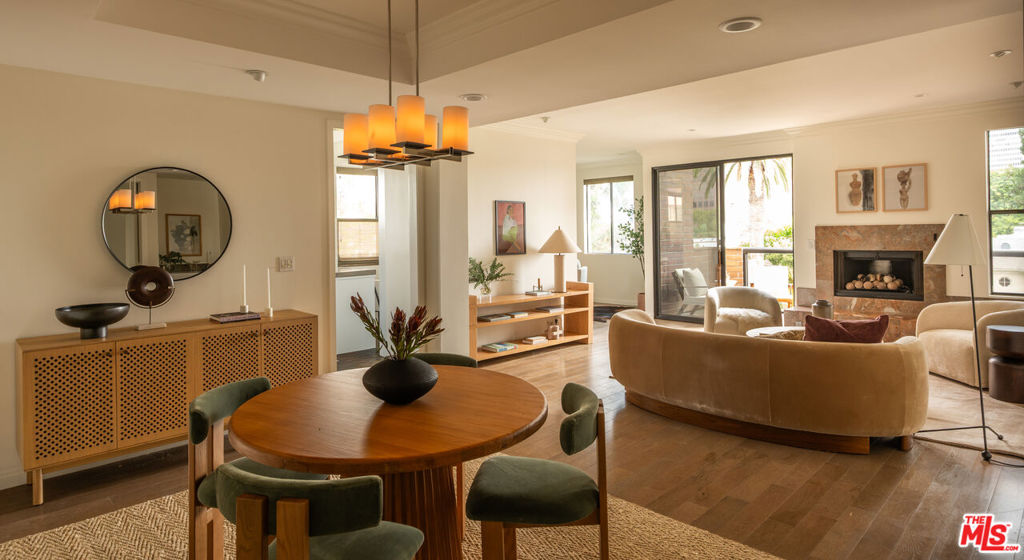 This refined condo in a boutique Beverly Hills building offers abundant natural light and an airy, open feel. Ideally located, it's just steps from a serene park, tennis courts, and exceptional dining. A rare blend of tranquility and urban convenience in an iconic location.