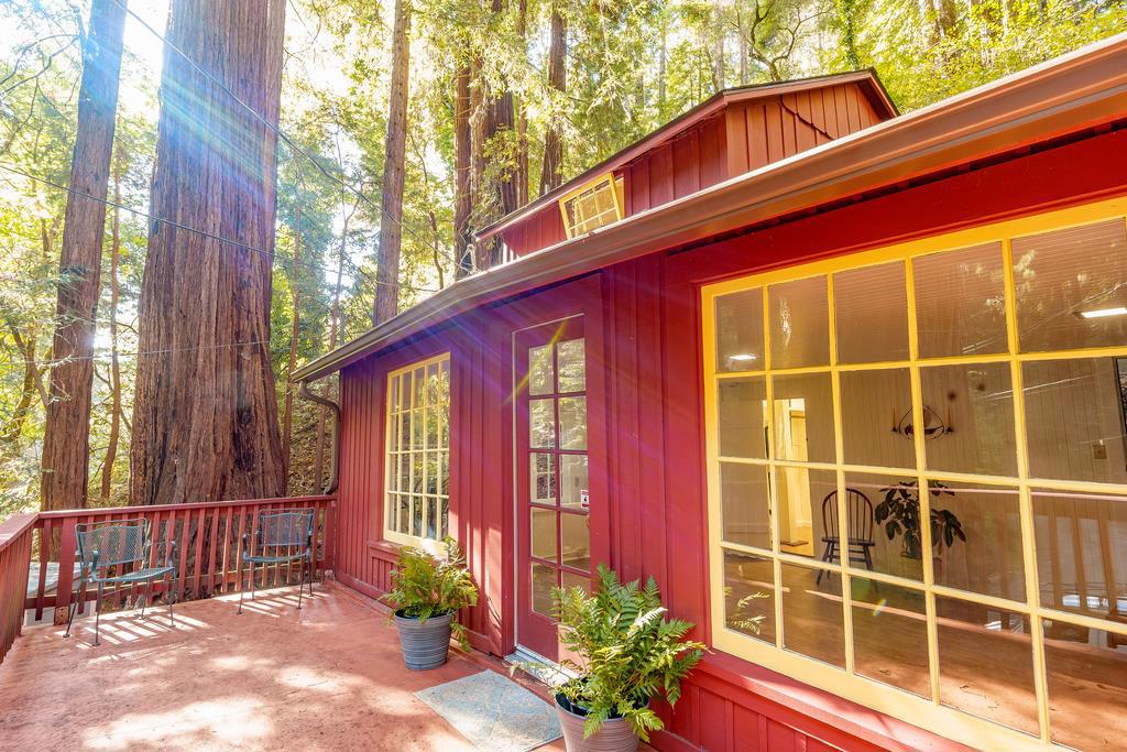 This charming 1930s cabin offers a perfect blend of rustic charm and modern updates. Just a 7-minute drive from Aptos Village and a 1/2 mile walk to the 10,000-acre Forest of Nisene Marks State Park. Thoughtfully updated with a new roof, fresh paint, new flooring, and more, this multi-level cabin, built with virgin redwood, is a serene retreat nestled among the majestic redwoods. Cozy up by the stone fireplace or unwind in one of the two luxurious clawfoot tubs after a day of outdoor exploration in the forest or at the beach! With its unique history as a former camp counselors cabin, this delightful home is ideal for anyone seeking a peaceful escape in a natural setting while staying close to town.