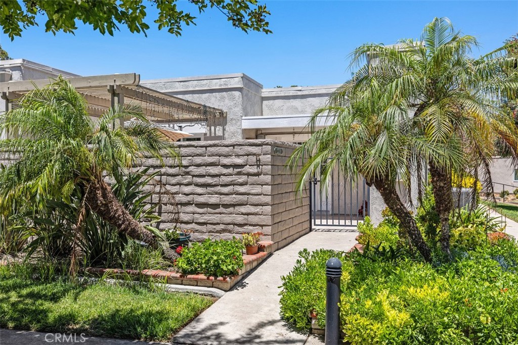 Short term, furnished, remodeled, highly sought after "New Valencia" floorplan in a 55+ community. 2 bedrooms, both queen size beds, 2 bathrooms with own laundry ready for your vacation. This unit has central heat and AC, dual pane windows, open kitchen fully equipped all open to the living room, dining room combination. Living room has large sectional sofa to enjoy watching a movie on the large screen TV. Convenient location with short walk to street parking right out front. Access from Gate 5 or 6 and nearby Clubhouse 4 with a pool and many crafting activities. Many things to do to keep you from getting bored on your vacation in this premier senior citizen community. Carport 2182 space 2