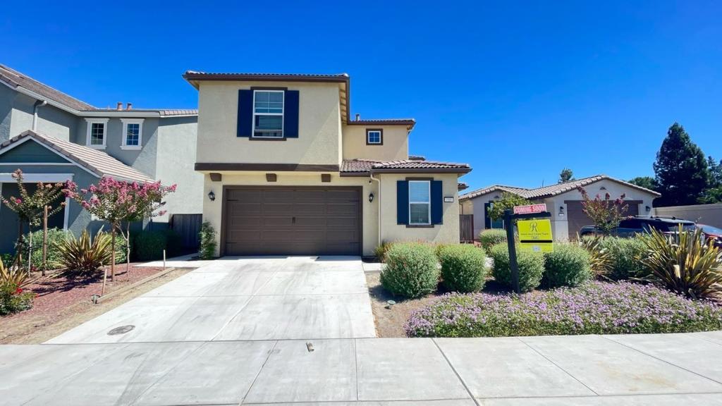 Welcome to a charming home located in the vibrant city of Hollister. This spacious residence offers 2,534 sq ft of living space, perfect for families seeking comfort and convenience. The kitchen is a culinary delight, featuring granite countertops, a gas oven range, and a pantry for all your storage needs. Additional amenities include a dishwasher, microwave, and garbage disposal, simplifying your daily routines. The home's flooring is a mix of carpet and tile, providing both warmth and easy maintenance. Cozy up by the fireplace on cooler evenings and enjoy the central AC during summer months. Laundry chores are made easy with facilities inside the utility room. Located within the Hollister Elementary School District, this property offers access to local educational institutions. The home also features energy-efficient solutions like solar power and a tankless water heater, ensuring sustainability and cost savings. With a 2-car garage, this house is ready to welcome you home.