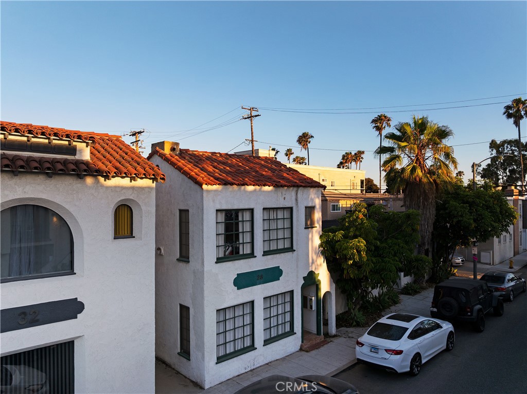 Welcome to 28 Argonne Avenue, a rare investment gem in the heart of Belmont Shore. This charming 4-unit property offers the perfect blend of timeless coastal living and long-term rental stability in one of Long Beach’s most sought-after neighborhoods.
The property features two 1-bed, 1-bath units and two 2-bed, 1-bath units, each with its own gas and electric meter for added convenience. A 2-car garage sits off the alley with shared laundry inside, and there's plenty of curb appeal thanks to thoughtful upkeep and that classic Belmont Shore charm.
Located near the beach and close to 2nd Street’s iconic shops, restaurants, and cafés, this location delivers when it comes to lifestyle and accessibility. Residents enjoy easy access to Rosie’s Dog Beach, the Belmont Pier, and over four miles of scenic coastline for leisure and recreation. The 2nd & PCH open-air shopping center is also nearby, offering everything from Whole Foods to boutique retailers and waterfront dining.
All units are currently occupied, reflecting the strong rental demand in this neighborhood.