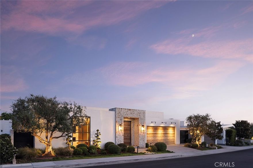 Sitting on a bluff and framed by sweeping views and of Newport Harbor, the Pacific Ocean, and golden evening sunsets, 624 Ramona captures the spirit of refined coastal living in Corona del Mar’s coveted Irvine Terrace. Every space of this single-level contemporary masterpiece is curated with intention—bathed in natural light, layered in texture, and designed for effortless indoor-outdoor flow.  The private entry opens to a stunning great room where floor-to-ceiling glass doors dissolve the boundary between inside and out. An open kitchen anchors the space with waterfall-edge counters, professional appliances, and a wet bar—setting the stage for everything from intimate dinners to lively gatherings under the stars. The primary suite is a sanctuary of calm, with a fireplace, retractable glass doors framing ocean views, and a spa-worthy bath that spills out to a private garden patio. Two fully appointed en-suite bedrooms, a media room, an office with room for guests (or optional fourth bedroom), and a dedicated massage room with infrared lighting offer both versatility and luxury. Every finish, fixture, and design element reflects the highest level of craftsmanship—resulting in a home that feels as effortless as it is elegant. Perfectly positioned moments from local yacht clubs, Newport Beach Country Club, Balboa Island, and all of the best shopping and restaurants, this residence defines the art of coastal California living.