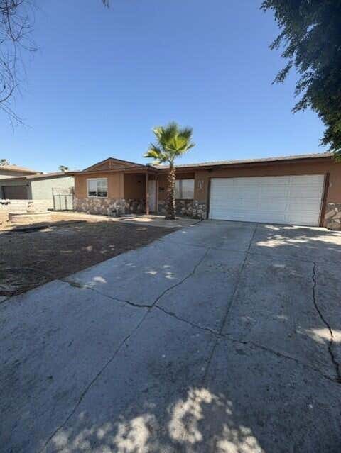 Photo of 82301 Olivera Way, Indio, CA 92201 (MLS # 219149859DA)