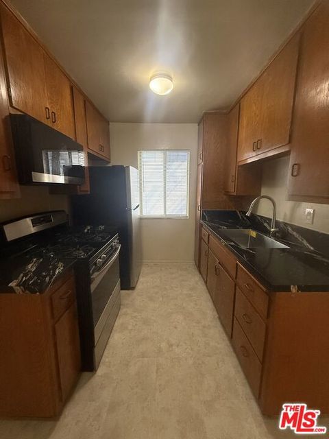 Photo of 1166 Amherst Avenue #6, Los Angeles, CA 90049 (MLS # 26637037)