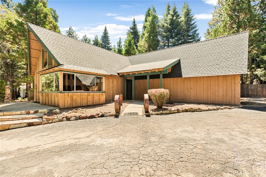 Beautiful Mountain Home in sought-after Upper Rowco neighborhood. Situated on two spacious lots a Two Car Garage with new garage doors, large loft above garage for potential living space for rental income, roomy shed and RV parking. Large front yard and large fenced back yard. This property offers both convenience and privacy. Large open living room with cathedral ceilings that create a warm open feel, cozy rock fireplace for the cool mountain nights. On main level there are two bedrooms, full bath and laundry. Upstairs two more bedrooms and two office spaces or extra bedrooms. Features gorgeous brand new carpet throughout, fresh interior paint and new garage doors. All this sets in a stunning natural setting for year round living or a relaxing getaway in the mountains. This property has solid bones with endless possibilities. Close to Ski Resorts, hiking and near by Village for shopping.