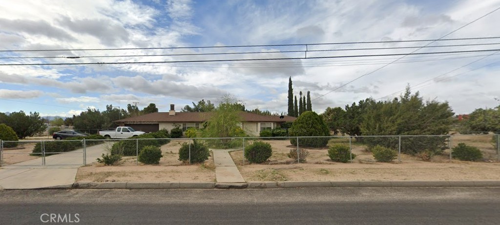 Spacious home and lot!!!!!!!!! The award winning Lewis "Bud" Adams, Sr, lived here for 35 years and his touches can be found hidden throughout the property. Wood burning fireplace in livingroom. This property could be an ideal project for a buyer looking to customize a home to their lifestyle . Hesperia is surrounded by natural beauty, including the San Bernardino and San Gabriel mountain ranges, and is known for its access to outdoor activities like hiking, biking, and fishing. affordable housing, but also for the pleasant desert climate, clean air, beautiful scenery and sunsets and hometown essence. The community is popular with outdoor adventurers due to its proximity to the Pacific Crest Trail (through several nearby trailheads and access points) , Lake Arrowhead (approx 32 miles), and Big Bear (approx 50 miles). While Hesperia offers a more relaxed, small-town feel, it remains relatively close to major Southern California cities like Los Angeles and San Bernardino, allowing residents to easily access job opportunities and amenities in those areas. Industries in the broader Victor Valley region include manufacturing, aerospace, logistics, and health care. Hesperia generally offers more affordable housing compared to many other Southern California cities, particularly major metropolitan areas. Transportation and utilities costs are lower than in cities like Los Angeles and Orange County. Retail establishments, include large department stores, grocery stores, and specialty shops including companies like Walmart, Target, ALDI, and The Home Depot.