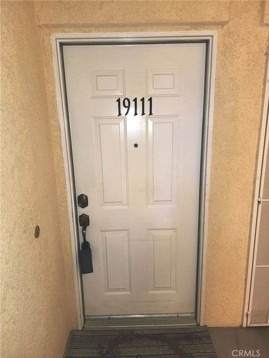 Priced to sell. Nice ground floor 2 bedroom, 2 bathroom unit in the gated Jess Ranch Brookhollow 55+ senior community. Jess Ranch is a gated community in Apple Valley located close to restaurants, shopping, movie theaters, hiking trails and more. Association includes 24 hour gated community with guard, pool, clubhouse and spa. The association pays for trash and water. This unit is light and  bright with 2 patios, one off the primary bedroom and one off the living room. The unit includes an assigned carport, an exterior storage space and is close to handicap parking. There is a recently purchased stacked washer and dryer in the unit. The entrance is at ground level, so no stairs to climb. Unit can use some cosmetic TLC, new appliances, new flooring to replace the current carpet and paint. While the information in this listing is believed to be from reliable sources, Buyer and Buyer's Agent are to verify all information to their own satisfaction.