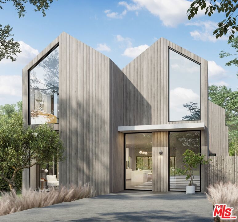 Welcome to your dream abode, where warm modern design meets serene living in the heart of the highly-sought North of Montana neighborhood. The main house is three-levels, with 6 en-suite bedrooms + Office, two powder rooms, and an enormous high-ceiling entertainment lower level. There is also a 1-bedroom 1-bath + living area in the detached ADU above the garage. Perfect for guests, family, or a separate office/gym. Built and designed by the highly-acclaimed duo at WylanJames Development, this striking residence features an open floor plan, seamlessly blending sophistication with comfort. Upon entering, you are greeted by an inviting atmosphere highlighted by a warm, neutral, and organic toned palette, creating a serene backdrop for modern living. The use of imported travertine and Taj Mahal stone throughout adds a touch of pure elegance and timeless beauty. Designed for both relaxation and entertainment, this home boasts an expansive living area that flows effortlessly into a gourmet kitchen, equipped with a generous marble island, high-end Miele appliances and custom all-natural wood cabinetry. The spacious layout is perfect for hosting gatherings or enjoying quiet family moments. Retreat to the luxurious primary suite, complete with large windows that offer peaceful views of the landscaped outdoor space, pool, city lights, and slight ocean views. The en-suite bathroom is a spa-like oasis, featuring elegant finishes, a deep soaking tub, and a walk-in shower with a skylight designed for ultimate relaxation. The entertainment level is a true highlight, featuring versatile spaces that can be tailored to your lifestyle, whether it's game nights, movie marathons, or simply unwinding with friends. Outdoor living is a highlight of this home, with a thoughtfully designed patio, pool & spa, and garden area that beckons you to enjoy the gentle Santa Monica ocean breeze. This architectural gem is not just a home; it's a lifestyle. Walking distance to Whole Foods, Award-winning Cafes & Restaurants, trendy boutiques on Montana Avenue, Erewhon, Soul Cycle, farmers market, and more. Not to mention the highly-acclaimed North Santa Monica schools, and living just moments from Santa Monica Will Rogers State Beach! This property offers the perfect blend of tranquility and convenience. Your new beginning awaits! Experience the best of N. of Montana living, where luxury meets comfort, and every detail has been thoughtfully curated for the discerning buyer. Renderings are a similar depiction, but not exactly accurate.