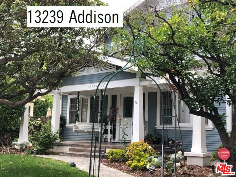 Beautifully updated 2-story California Craftsman blends classical architecture and charm with conscientious updates harmonizing traditional sensibilities with updated conveniences. The floor plan includes 4 spacious bedrooms including 2 primary bedrooms (one up and one down) assuring maximum flexibility. The chef's kitchen features a large center island with wine chiller, high end appliances, a definite focal point for entertaining. Electric vehicle charger. 1 bathroom remodeled this year. Soaring ceilings amplify an airy expansive dimension. Copious sized backyard, verdant front yard and porch including a loveseat swing contribute to making this impeccably maintained property more than a house. It is a home. The only thing this home is missing is you!