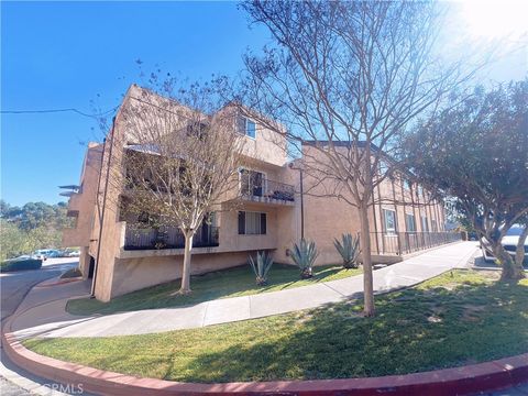 Photo of 1761 Neil Armstrong St #204, Montebello, CA 90640 (MLS # WS26061436)