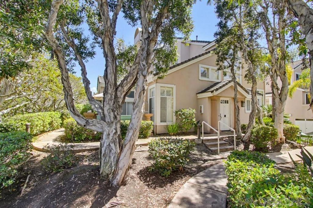 Photo of 12922 Carmel Creek Rd. Rd #32, San Diego, CA 92130 (MLS # 260008973SD)