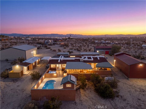 Photo of 69053 Rainier RD, 29 Palms, CA 92277 (MLS # JT26209068)