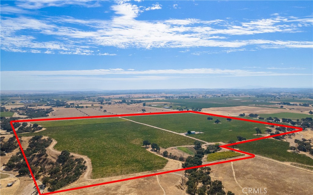 Here is a fantastic opportunity to own a 130 +/- acre vineyard property in the Paso Robles Estrella District. The Armour Ridge Vineyard consists of 98+/- planted acres of Cabernet Sauvignon, Merlot and Syrah grapes. In addition, the 40x30 metal shop with attached carport is conveniently located near the productive Ag well. While the level terrain allows for ideal, easy farming, you will also have the benefits of this vineyard being in the Williamson Act. Whether you are looking to expand your investment portfolio, grow an existing viticulture program, or create a stunning vineyard estate, Armour Ridge is ready for you!