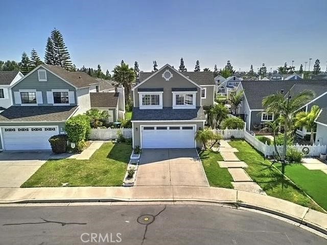 Nestled in the desirable Evergreen Ridge community, this beautifully maintained 3-bedroom, 2-bath single-story home offers comfort, style, and access to one of Orange County’s most sought-after amenities — Lake Mission Viejo. As a member of the Lake Mission Viejo Association, you’ll have year-round access to beaches, boating, fishing, concerts, and community events — all just minutes from your front door. Inside you’ll find a light-filled, open floor plan with vaulted ceilings. The living room features a cozy fireplace and flows seamlessly into the dining area, perfect for entertaining. Outside, enjoy a private backyard oasis with a covered patio, low-maintenance landscaping, and space for outdoor dining or relaxing. Located near Trabuco Hills High School, shopping, dining, and with easy freeway access, this home perfectly blends tranquility with convenience. Note: Brand new AC condenser installed!