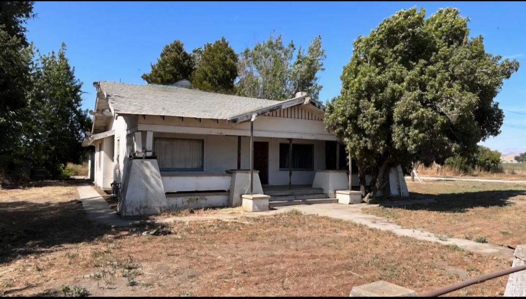 Discover a versatile 19.910-acre property at 4020 San Juan Hollister Rd, San Juan Bautista, sold as-is, located at the key intersection of San Juan Hollister Rd (Highway 156) and Union Rd. Bordered by San Juan Hollister Rd (front) and Freitas Rd (back), it offers dual access and benefits from recent Highway 156 upgrades, including roundabouts for safer travel to San Juan Bautista (3 min), Hollister (3 min), and Highways 156 & 101. Zoned Agricultural/Rural (San Benito County Code § 25.03.004) and not in the Williamson Act, this 100% flat, usable land is perfect for an event center, homestead, agriculture, or investment. The property includes a home needing major repairs, a rental unit for added value, two barns for storage or equestrian use, and an on-site caretaker for maintenance and security. With a reliable well, septic system, electricity, and solar potential, the land supports farming, vineyards, livestock, or equestrian facilities. Scenic hill views ensure privacy, and the flat terrain maximizes development potential (per county rules). Schedule a tour to explore this flexible San Benito County gem! Note: Development subject to San Benito County zoning. Buyer to verify details and structure conditions.