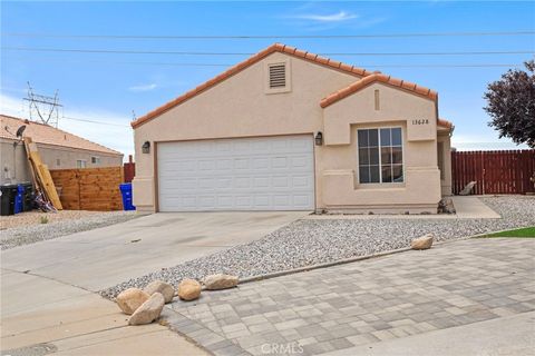 Photo of 13628 Monterey Ct, Victorville, CA 92392 (MLS # CV25244535)