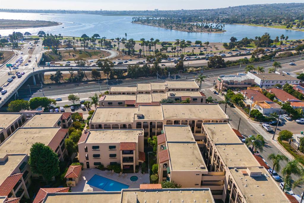 Wake up to stunning Mission Bay views in this bright 2-bed, 2-bath Clairemont home. The open layout features wide sliding doors leading to a private balcony, perfect for sunset views or morning coffee. Fresh, neutral interiors and low-maintenance flooring create a clean canvas ready for your style. Two assigned parking spaces and a prime location near beaches, bay parks, shopping, and dining make this home an ideal coastal retreat.
