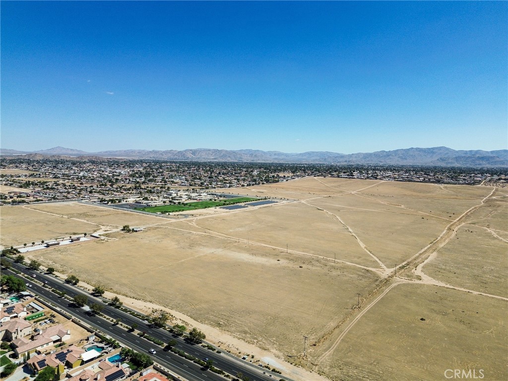 ***ANOTHER PRIME LOCATION WITH THIS 18.9 ACRE SITE FOR FUTURE DEVELOPMENT IN THE HEART OF APPLE VALLEY!*** 18.9 Acres zoned commercial with frontage on highly traveled Apple Valley Rd. Note, the Town of Apple Valley has indicated an interest for development at this location and would consider a Specific Plan over this parcel and adjoining parcel. In addition, the adjacent 78.7 acres split zoned, (19.7 acres of it zoned commercial) OP and RSF is available. if purchased together would create a nearly 40 acre commercial site with Apple Valley Rd. frontage, along with the remaining acreage (approx. 58 acres) for office, professional, medical and single family homes at the Eastern portion of the property. The development opportunities for this land is unlimited with the parcel large enough to accommodate nearly any commercial development at one of the most desirable areas in the High Desert. All utilities, including sewer are available and there are no joshua trees on the property to impede any development. Schools, churches, shopping, restaurants, medical facilities, etc. are all very close, Incredible location in the path of major, new growth and a perfect location for a medical or educational campus, retail center with major anchor tenants, etc.