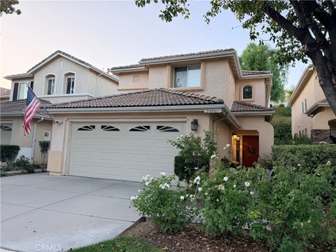 Photo of 25561 Burns Pl PL, Stevenson Ranch, CA 91381 (MLS # SR26226706)