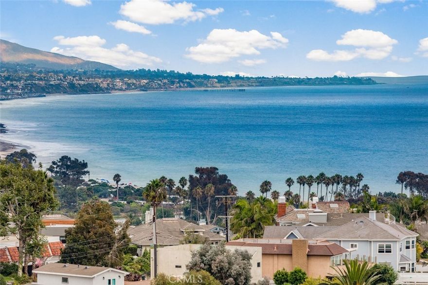 A Hidden Jewel with Breathtaking Views from Every Level! Perched in the heart of Dana Point’s coveted Lantern Village, this newly remodeled coastal sanctuary offers an exceptional blend of timeless elegance and contemporary luxury. With approximately 6,146 square feet of open living space, this 5 bedroom, 6 bathroom residence is a rare find. From the moment you step inside, you're greeted with panoramic whitewater ocean views that span across all levels. The expansive main floor features an open-concept layout with consistent designer flooring throughout, a wraparound deck perfect for entertaining, and a gourmet kitchen outfitted with state-of-the-art Thermador appliances, a wine bar, and endless ocean vistas. With soaring ceilings, clean lines, and walls bathed in natural light, this home is also the perfect canvas to showcase an art collection or create your own private gallery. The upper level includes a private-entry flex space ideal for an office, guest suite, or artist’s studio. An elevator provides effortless access to each floor, and the 3 car garage, ample storage, outdoor grassy area, and outdoor shower add to the home’s livability and appeal. This architectural gem radiates California chic with modern flair, neutral tones, sleek finishes, and thoughtfully designed outdoor areas that embrace the coastal surroundings. Located moments from the revitalized Dana Point Harbor, world-class dining, boutique shopping, and scenic beaches, this stunning home is truly a must see. Indulge in the ultimate coastal lifestyle, where luxury meets tranquility and creativity finds its home.