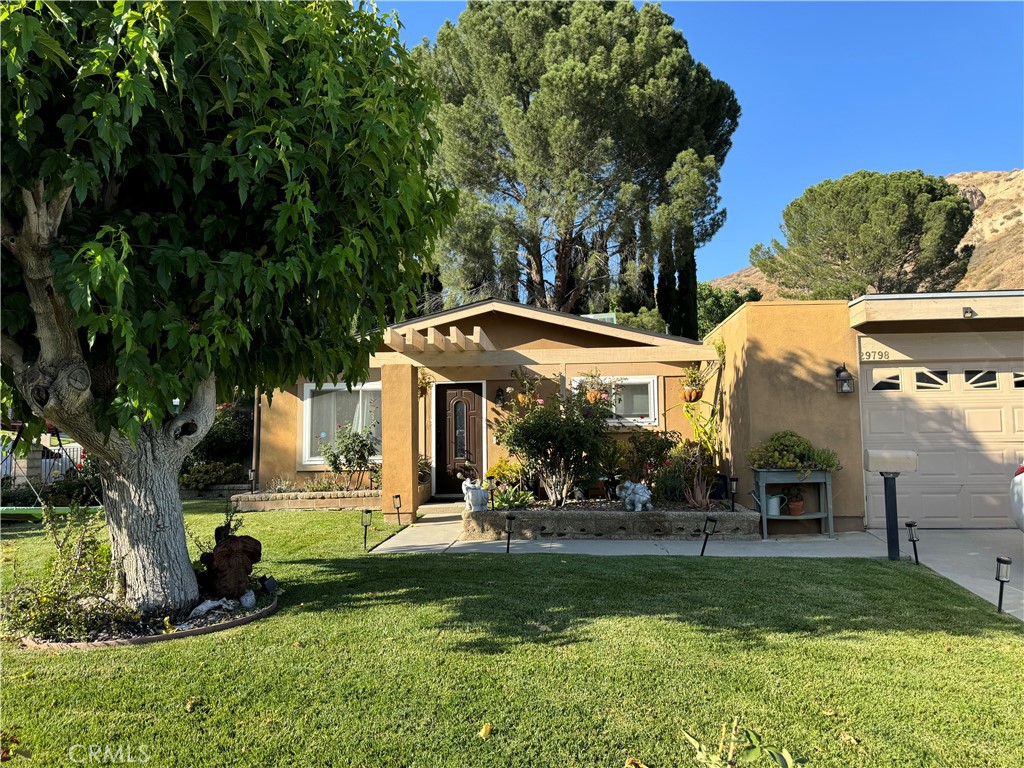 Welcome to your spacious new home in Canyon Country, Santa Clarita! This wonderful corner single family dwelling contains 4-bedrooms, 2 bathrooms, the home offers comfort, convenience, and plenty of room. Step inside to the spacious main living area, perfect for family gatherings or quiet evenings. The kitchen offers a fairly new and maintained stove, fairly new sink, along with a white marble painted kitchen island. The home also contains a second living room/family room perfect for movie nights and game nights.
Furthermore, you'll find 2 bedrooms that include closets and an extra bedroom that can be used as a guest room and/or office area; now for the master bedroom; a generous amount of room, a walk-in closet, and a private bath. Enjoy the Southern California sunshine in your huge, private, fenced backyard with patio —ideal for weekend BBQs, pets, or just unwinding after a long day, along with a big front yard with a tree that provides great shade. The home also comes with a dedicated two-car driveway, two-car garage, and laundry.
Located in a highly sought-after, family-friendly neighborhood, you're just minutes from top-rated schools, beautiful parks, Six Flags, and newly developed shopping centers. This home is conveniently right off the 14 Freeway and minutes away from the I-5 Freeway.
Available starting August 1, 2025 for a (minimum) 12-month lease. We're looking for responsible tenants who will love and appreciate this home as much as we do.