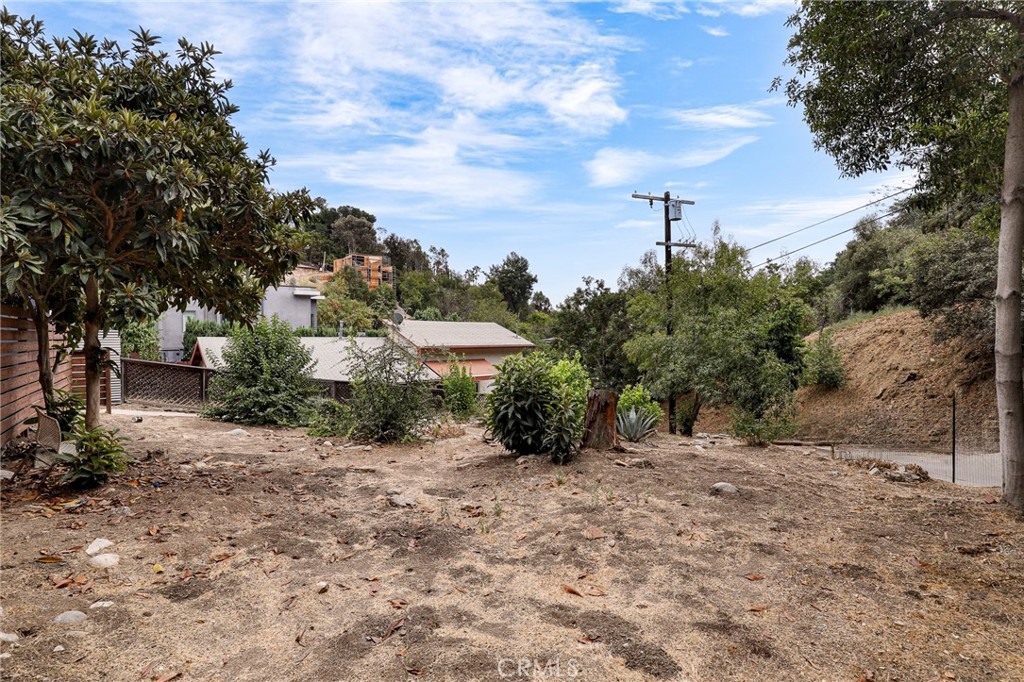 Discover the ideal canvas for your future home in one of Los Angeles' most peaceful and desirable neighborhoods. This subdivided vacant 3,565.6 sq ft lot is tucked away on a quiet street, offering a rare combination of tranquility, privacy, and accessibility.
Just minutes from Downtown Los Angeles, the location provides convenient access to the 110, 5, and 10 freeways, placing you close to Chinatown, Highland Park, Dodger Stadium, Walt Disney Concert Hall, The Broad Museum, LA Live, and more. Outdoor enthusiasts will appreciate nearby Elysian Park and Debs Park—perfect for hiking, picnicking, and taking in sweeping city views.
Zoned R1 and located within the Mount Washington/Glassell Park Specific Plan, the property is approved for single-family residential use. Preliminary plans support a two-story, 1,700 sq ft home with 4 bedrooms and 3.5 bathrooms—ideal for comfortable urban living.
Included supplemental documents: Grading Pre-Inspection Report, Topographic Survey, WWD Soil Information, 2024–2025 Tax Receipt, Determination Letter, Referral Form, and complete property details. Distance to water source unknown. Please contact LADWP: Construction and RenovationL Water Service: 213-367-2130 and/or LADWP: General Water Distribution Engineering: 213-367-1182 for more information.
This is a rare opportunity to build a custom home in a prime hillside location— where peaceful living meets the pulse of the city.