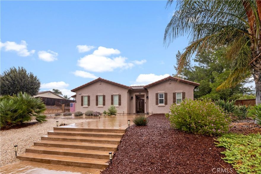 Welcome to your dream home in the highly sought-after Rancho La Laguna tract! This stunning single-story pool and spa home features 4 bedrooms, 3.5 bathrooms, and 2,662 sq ft of living space on an expansive 21,344 sq ft corner lot in a quiet cul-de-sac. The property includes a detached Casita with private bath, perfect for multi-generational living, a home office, or guest accommodations. With PAID OFF solar, RV parking with hookups and dump station, and a resort-style backyard, this home truly has it all. Enjoy a spacious open floorplan with 9-ft ceilings, plantation shutters, and neutral tile flooring throughout. The gourmet kitchen offers granite countertops, a center island, black appliances, a large sink, and ample cabinetry, opening to a large family room with a cozy fireplace and custom built-in entertainment center. A separate formal living and dining area adds even more space for entertaining. The primary suite features a large walk-in closet, jetted tub, separate shower, and tile finishes. Generous secondary bedrooms and a full-size indoor laundry room with sink offer comfort and convenience. Step outside to a beautifully landscaped backyard with a covered alumawood patio, custom BBQ island with fridge and kegerator, artificial turf, and a sparkling pool and spa, all designed to enjoy the stunning sunsets and scenic hill views. This home will not last.