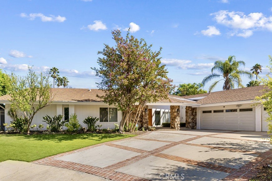 Prime Encino Lease – South of the Blvd! Tucked away on a cul-de-sac in one of Encino’s most sought-after neighborhoods, this spacious 4-bedroom, 4-bath pool home offers the perfect blend of comfort, style, and lots of space. Step inside to a bright open floor plan with gleaming hardwood floors, a sunken family room, and a dramatic double-sided glass fireplace. Walls of windows fill the home with natural light, while the game room is set up with a cozy fireplace and wet bar, and the glass doors open seamlessly to the back yard. The chef’s kitchen features a Viking range, stainless steel appliances, and ample counter space, ideal for both casual dining and gourmet cooking. The primary master-suite is a true retreat with direct pool access, a generous walk-in closet, and a spa-like bath featuring a steam shower for two with body sprays, a jacuzzi tub, dual vanities, and even a towel warmer. A private guest suite/maid’s quarters with its own entrance offers flexibility for extended family or live-in help. Outdoors, enjoy a resort-style backyard with a sparkling pool, fire pit, and expansive deck that's perfect for relaxing or entertaining year-round. Additional highlights include a 3-car garage with built-in cabinetry, abundant storage, and great location for an easy walk to restaurants and shops along Ventura Blvd.