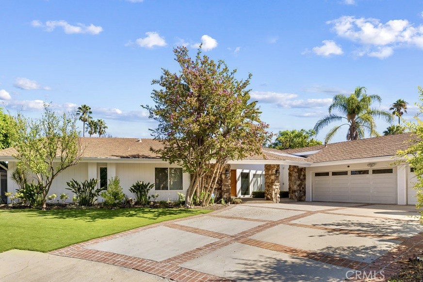 Prime Encino Lease – South of the Blvd! Tucked away on a cul-de-sac in one of Encino’s most sought-after neighborhoods, this spacious 4-bedroom, 4-bath pool home offers the perfect blend of comfort, style, and lots of space. Step inside to a bright open floor plan with gleaming hardwood floors, a sunken family room, and a dramatic double-sided glass fireplace. Walls of windows fill the home with natural light, while the game room is set up with a cozy fireplace and wet bar, and the glass doors open seamlessly to the back yard. The chef’s kitchen features a Viking range, stainless steel appliances, and ample counter space, ideal for both casual dining and gourmet cooking. The primary master-suite is a true retreat with direct pool access, a generous walk-in closet, and a spa-like bath featuring a steam shower for two with body sprays, a jacuzzi tub, dual vanities, and even a towel warmer. A private guest suite/maid’s quarters with its own entrance offers flexibility for extended family or live-in help. Outdoors, enjoy a resort-style backyard with a sparkling pool, fire pit, and expansive deck that's perfect for relaxing or entertaining year-round. Additional highlights include a 3-car garage with built-in cabinetry, abundant storage, and great location for an easy walk to restaurants and shops along Ventura Blvd.