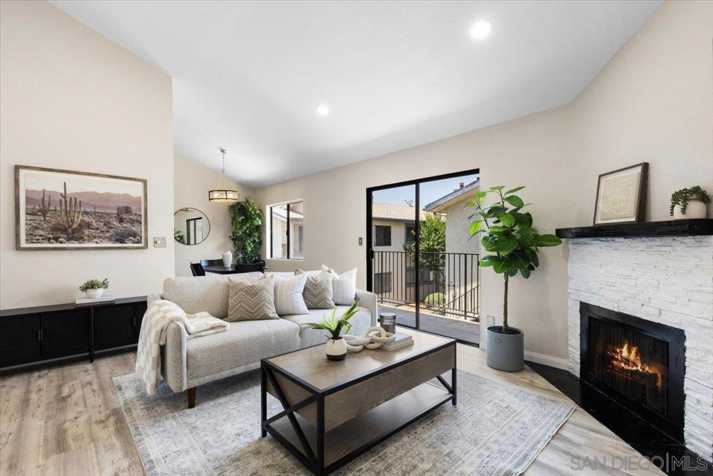 Welcome to your dream home at 12650 Lakeshore Drive, Unit 156, in charming Lakeside, CA. This exquisite 2-bedroom, 2-bathroom top-floor unit spans 884 square feet and has been fully remodeled to offer both luxury and convenience. Step inside to discover elegant luxury vinyl plank flooring that flows throughout, complemented by the warmth of a fireplace and the spaciousness of vaulted ceilings. The modern kitchen and renovated baths boast high-end finishes, including a double sink in the primary bathroom, ensuring comfort and ease. Enjoy the convenience of having an in-unit washer and dryer, and ample private storage space for all your needs. Step out onto your private balcony, or relax on the patio, perfect for unwinding and enjoying the serene surroundings. This home comes equipped with central air conditioning and heating for year-round comfort. The gated community features a range of desirable amenities, including a communal pool, assigned parking, and additional guest parking, offering convenience and peace of mind. With its prime location and thoughtful renovations, this home is a rare find. Whether you're enjoying the high ceilings or the luxury of modern upgrades, this unit offers a smart blend of style and function, promising a delightful living experience. Don't miss the opportunity to make this remarkable property your own.