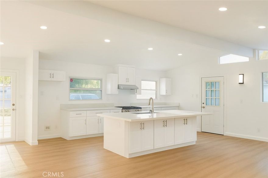 Charming West Covina cul-de-sac home with a spacious backyard. This home features a remodeled modern kitchen with new cabinets, countertops, and appliances, an open floor plan, high ceilings, and abundant natural light throughout. Recent upgrades include all-new flooring, remodeled bath, fresh paint, energy-efficient lighting, brand new AC units, and an epoxy garage floor. A new sliding door opens to a backyard oasis with fruit and flower trees and plenty of space for entertaining or possible adding an ADU. Conveniently located near schools, shopping, dining, and freeway access.