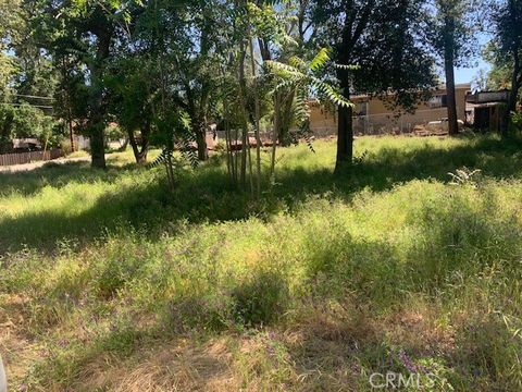 Photo of 14245 Woodland DR, Clearlake, CA 95422 (MLS # LC26101975)