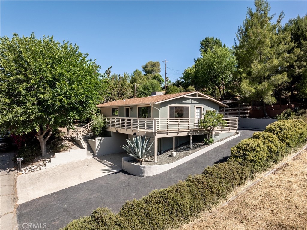 Discover the Charm of Mid-Century Modern at 325 Fairview!
This lovely, updated residence features an open floor plan that seamlessly connects the living, dining and kitchen areas, creating a fluid and inviting space ideal for both casual gatherings and formal entertaining.
Large windows flood the living room with natural light, creating a welcoming feel as you enter the home. The three bedrooms all feature their own baths for the maximum of privacy.
With its clean lines, its setting above the street, and its easy access to the covered patio, the home provides a private sanctuary to enjoy the quiet of Westside living.
If visiting, don't miss the terraced rear yard above the house with several areas ready for your imagination