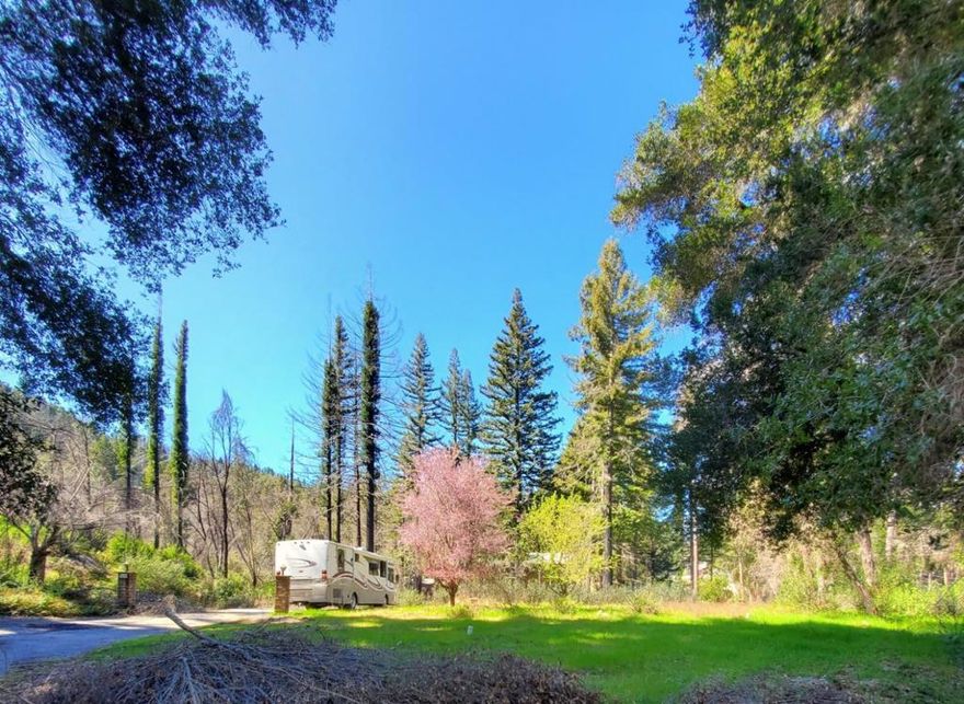 Opportunity knocks! Come see this beautiful 2.5 acre parcel surrounded by neighboring new/rebuilt homes!  Conveniently located between Downtown Boulder Creek and Boulder Creek Golf Course and not too far to Big Basin State Redwood Park. The original home burned down in the 2020 CZU fire. The debris removal was completed and signed off. Here is your chance to create your custom mountain masterpiece! Buyer to contact Santa Cruz County Planning Dept regarding rebuilding requirements/process. Big Basin Water, PG&E, propane gas (Ferrellgas), and local sewer served the original house. Buyer to investigate the status of all utilities/connections. Centrally located to Los Gatos/Bay Area and Monterey/Carmel. Live in the Mountains and drive to Santa Cruz Beaches-Fantastic opportunity!